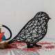 Petite sculpture charmante de moineau